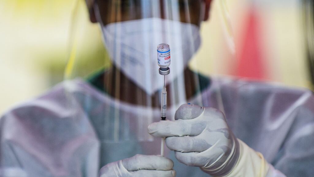 Covid-19: being vaccinated does not stop you from picking up or transmitting coronavirus. Photograph: Ishara S Kodkikara/AFP via Getty