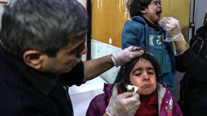 Injured children receive medical attention inside a hospital after bombings and shelling allegedly by forces loyal to the Syrian Government. Photograph: Mohammed Badra/EPA
