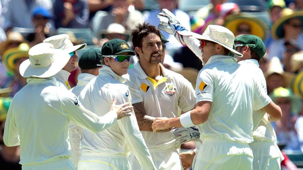 Mitchell Johnson celebrates after taking the wicket of Ben Stokes on day three of the third Ashes test match between Australia and England. Photograph: Dave Hunt/EPA
