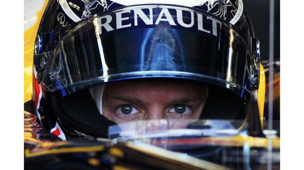 Red Bull Formula One driver Sebastian Vettel sits in his car during the first practice session of the Canadian F1 Grand Prix. The world champion crashed into the "Wall of Champions" during practice. photograph: Chris Wattie/Reuters