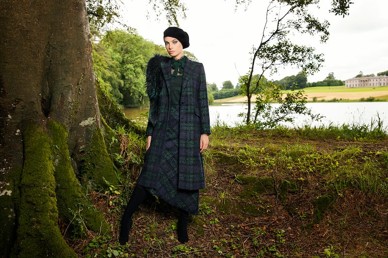 Louise Kennedy: Callie Black Watch tartan tweed coat €1,495, Kristina skirt €695, Bobbi blouse in green and black polka-dot tulle €495