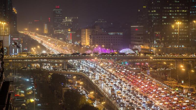 Beijing gridlock: with six million cars clogging the streets, the Chinese capital’s traffic snarl-ups leave little scope for big egos in fancy SUVs pulling up for soccer training. Photograph: Xiao Lu Chu/Getty