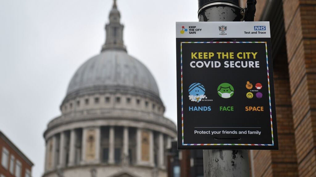 Covid-19 signage in front of St Paul’s Cathedral in London, where mayor Sadiq Khan has declared a ‘major incident’ as the spread of coronavirus threatens to ‘overwhelm’ the city’s hospitals. Photograph: Dominic Lipinski/PA Wire