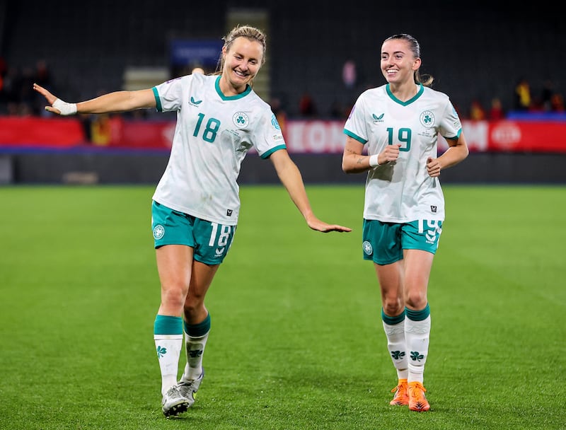 Kyra Carusa and Abbie Larkin celebrate after Tuesday's match in Belgium. Photograph: Ryan Byrne/Inpho