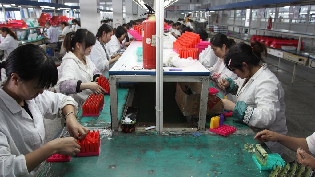 A Chinese factory. In China the minimum wage is 85 cent an hour, whereas it is $15 in Australia.