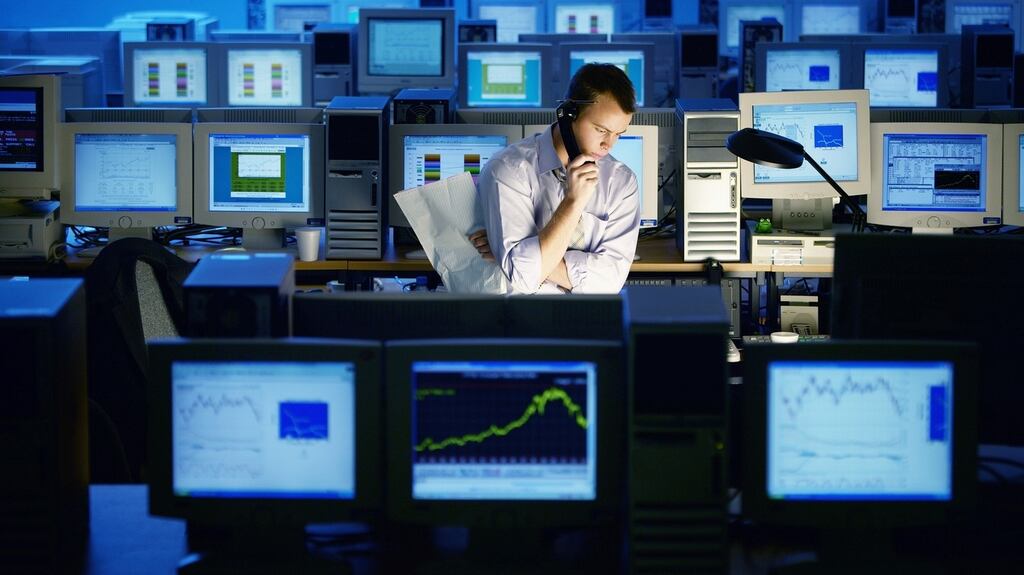 One of the downsides of living in a television programme is that you often find yourself working late in a massive office. But rather than leave the lights on like a sensible person, you prefer to work by the light of a small desk lamp. Photograph: Getty Images