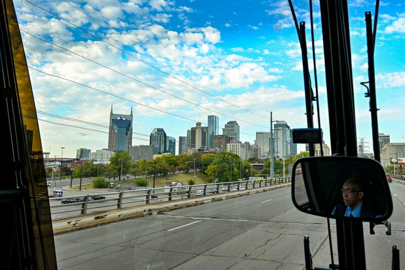 The Nashville skyline looms as the bus heads toward the Tennessee city. Photograph: Kenny Holston/The New York Times