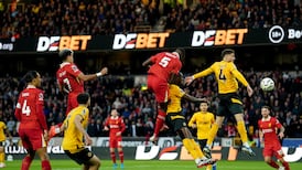 Liverpool go top of the Premier League after win at Wolves