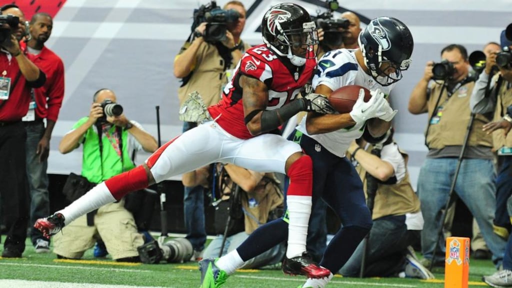 Golden Tate of the Seattle Seahawks makes a catch for a touchdown against Robert Alford of the Atlanta Falcons at the Georgia Dome in Atlanta. Photograph: Scott Cunningham/Getty Images