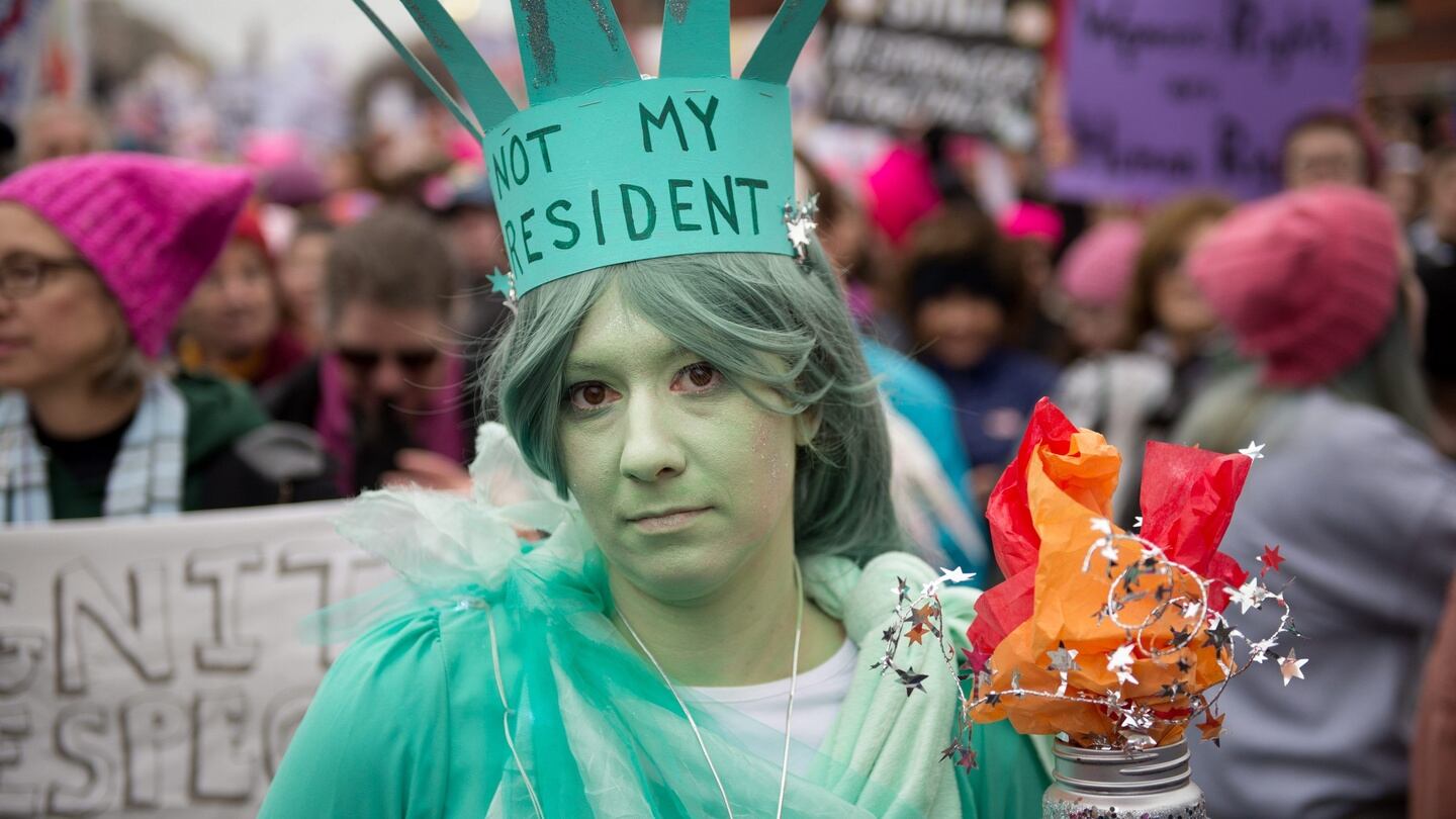 People gather along Independence Avenue for the Women’s March on Washington on Saturday. Photograph:Tracie Van Auken/EPA