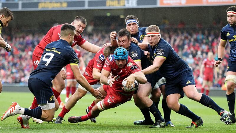 Irish man Tadhg Beirne scores Scarlets’ fourt try against Munster. Photograph: Billy Stickland/Inpho