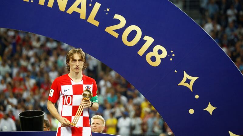 Luka Modric receives the Golden Ball award. Photograph: Kai Pfaffenbach/Reuters