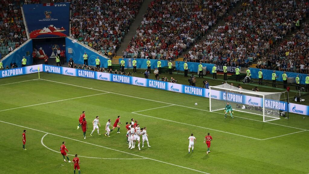 Cristiano Ronaldo completes his hat-trick for Portugal with a free-kick in the World Cup Group B game against Spain at the Fisht Stadium in Sochi. Photograph: Michael Steele/Getty Images