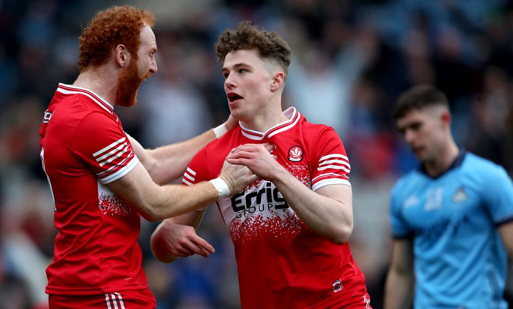 Derry's Eoin McEvoy celebrates with Conor Glass (left) after scoring a goal against Dublin in the league final victory at Croke Park. Photograph: Leah Scholes/Inpho