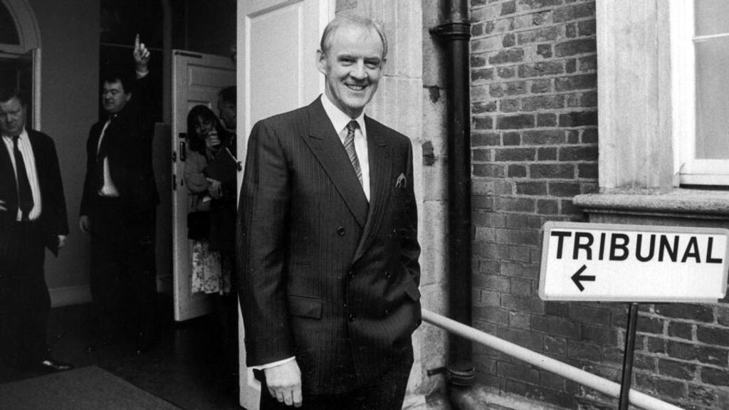 Meat Entrepeneur Larry Goodman poses while exiting proceedings of the Tribunal of Inquiry into the Beef processing industry in Dublin Castle in March 1993.Photograph: Matt Kavanagh
