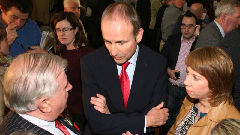 Fianna Fáil leader Micheál Martin with Senator Terry Leyden and Cllr Orla Leyden at the Roscommon South Leitrim byelection count this evening. Photograph: Brian Farrell.