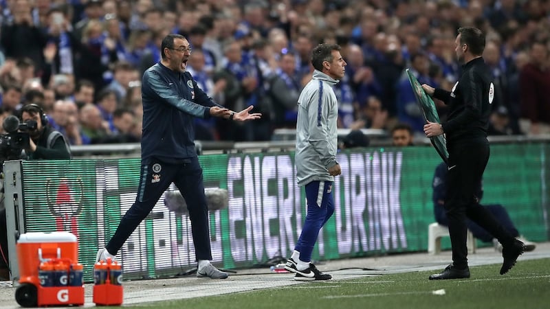 Chelsea manager Maurizio Sarri reacts as his goalkeeper Kepa Arrizabalaga refuses to leave the pitch after his proposed substitution during the Carabao Cup Final. Photograph: Nick Potts/PA Wire