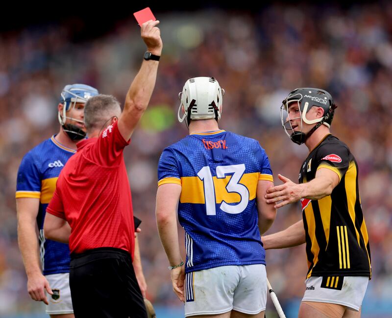 Referee James Owens red-cards Darragh McCarthy of Tipperary. Photograph: James Crombie/Inpho