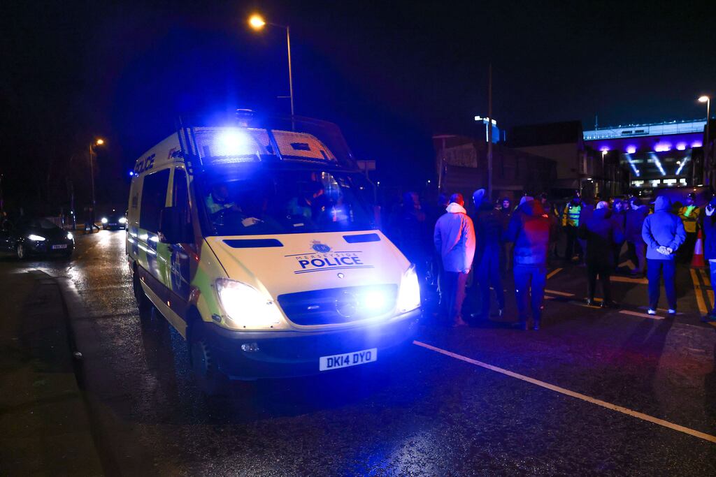 A large police presence outside the stadium as Everton fans protest against the club's board after the Premier League match at Goodison Park. Photograph: Peter Byrne/PA Wire