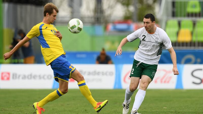 Joseph Markey of Ireland in action against Artem Krasylnykov of Ukraine in the men’s 7-a-side football preliminaries at Deodoro Stadium in Rio de Janeiro. Photograph: Diarmuid Greene/Sportsfile