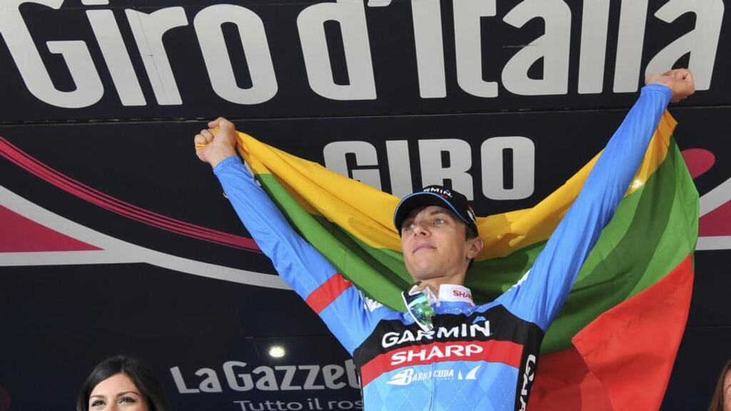 Navardauskas Ramunas celebrates on podium after winning the 11th stage of the Giro d’Italia from Tarvisio to Vajont on Wednesday. Photograph: AP Photo