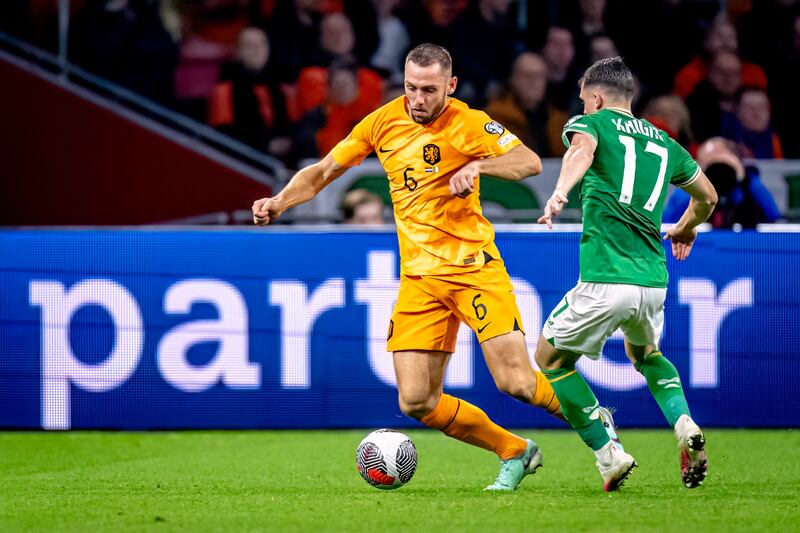 The Dutch central defender and occasional playmaker Stefan de Vrij takes on Jason Knight. Photograph: Marcel van Dorst/NurPhoto via Getty Images