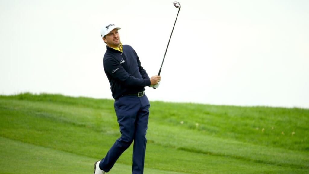 Graeme McDowell of Northern Ireland plays into the first green during his match against Alexander Levy of France at the Volvo World Matchplay Championship at The London Club in Ash. Photograph: Richard Heathcote/Getty Images