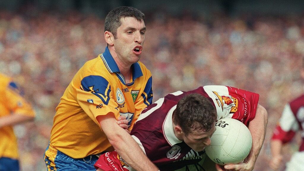 Jarlath Fallon of Galway keeps possession despite the attentions of Roscommon’s Damien Donlon during the Connacht final in 1998. Photograph: Inpho.