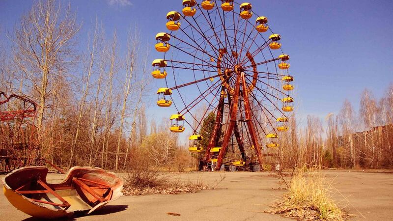 An abandoned Ferris wheel in the ghost town of Pripyat – still considered too dangerous for human habitation. Photograph: Getty
