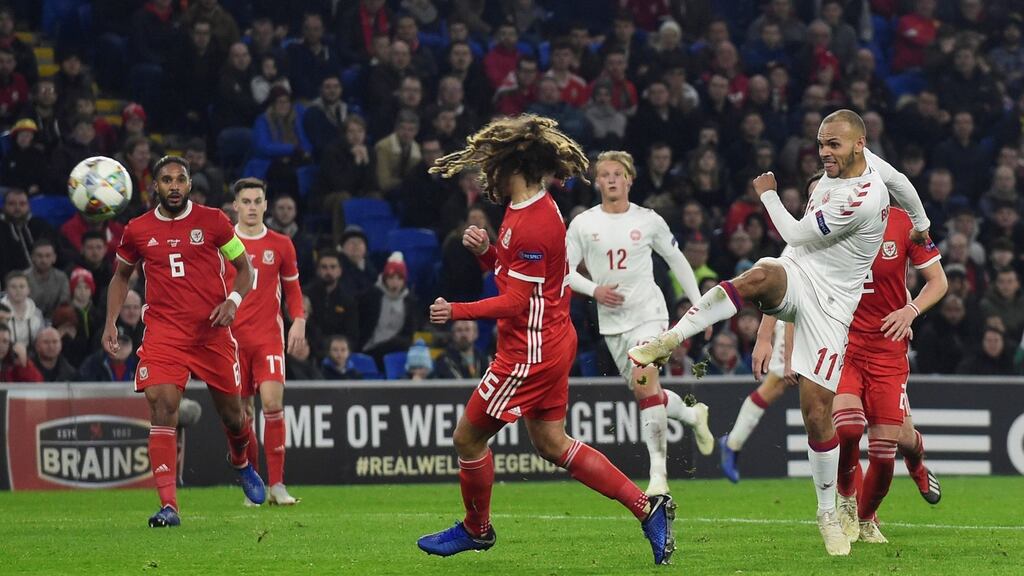 Denmark’s Martin Braithwaite scores their second goal in the Uefa Nations League Group B match against Wales at Cardiff City Stadium. Photograph: Rebecca Naden/Reuters