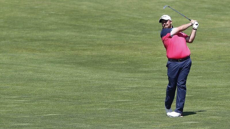 Shane Lowry of Ireland hits from the fairway on the 14th hole during the first round at the 117th US Open Championship at Erin Hills. Photo: Erik S Lesser/EPA