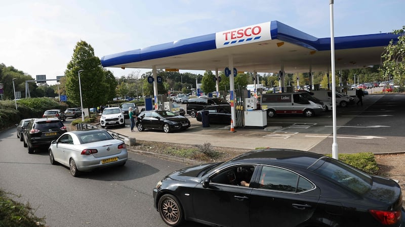 A line of vehicles at a petrol station in Camberley, west of London. Photograph: Adrian Dennis/AFP via Getty