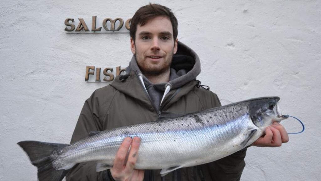Eoin McManus, Ballyshannon, with the first salmon of 2014 caught on the Drowes river on a Rapala lure.