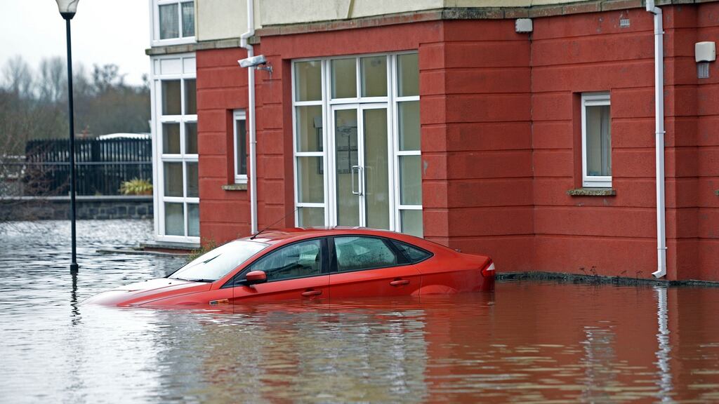 A car almost submerged in the flooded area of Carrick-on-Shannon, Co Leitrim. Photograph: Eric Luke