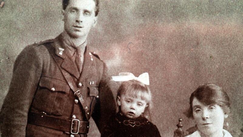 Michael O’Driscoll with his wife Mary and child.