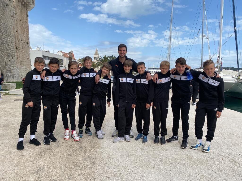 Shakhtar Donetsk: coach Edgar Cardoso with some of the academy players still in Croatia. Photograph: Shakhtar Donetsk
