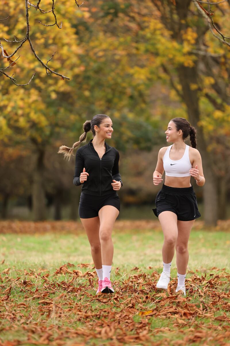 While a run club may be some people’s idea of a nightmare, Eoin says you don’t have to be super fit to come along, and that the club suits all levels of fitness. Above: Run Club members Eduarda Santana and Elen Weber. Photograph: Dara Mac Dónaill