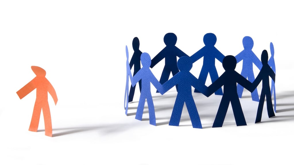 We are naturally drawn to groups and to the members of our own group as insiders seeing the rest as outsiders. Photograph: iStock