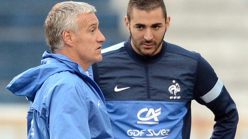 A file photo from June 2013 shows French head coach Didier Deschamps speaking to forward Karim Benzema during a training session at the Gremio Stadium in Porto Alegre, Brazil. Photograph: Franck Fife/AFP/Getty Images