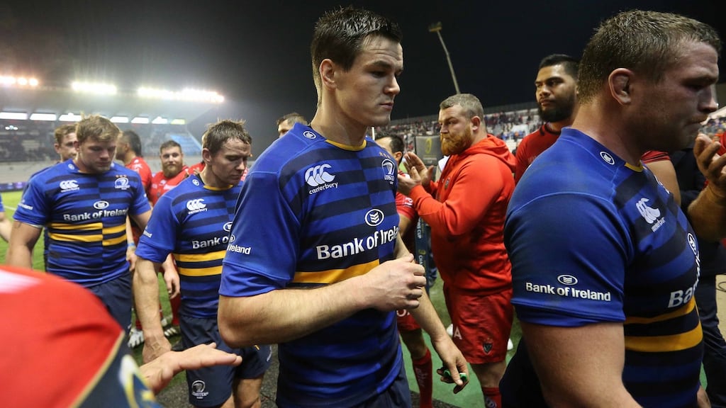 Leinster’s Jonathan Sexton leaves the pitch dejected after the game. Photo: Billy Stickland/Inpho