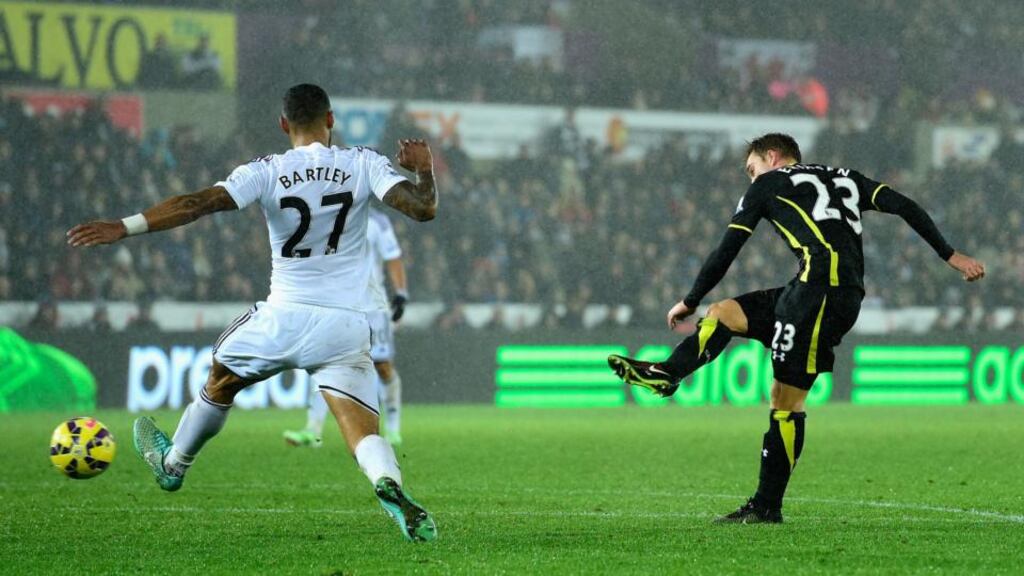 Spurs player Christian Eriksen fires in the winning goal during the Premier League match against Swansea City at Liberty Stadium. Photograph: Stu Forster/Getty Images