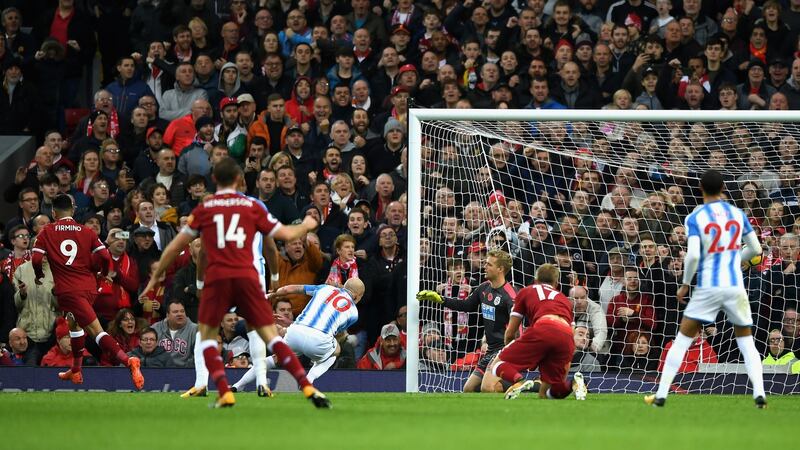 Roberto Firmino doubles Liverpool’s lead at Anfield. Photograph: Gareth Copley/Getty