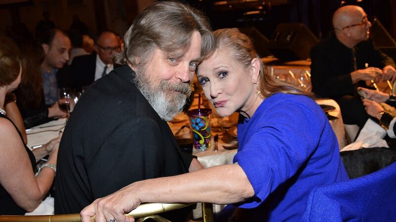 Mark Hamill with Carrie Fisher, who died last December. “I’m still in denial. I still think of her in the present tense.” Photograph: Araya Diaz/Getty Images