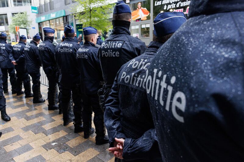 Belgian police block the entrance to the venue hosting the National Conservatism Conference in Brussels. Photograph: Simon Wohlfahrt/AFP via Getty Images