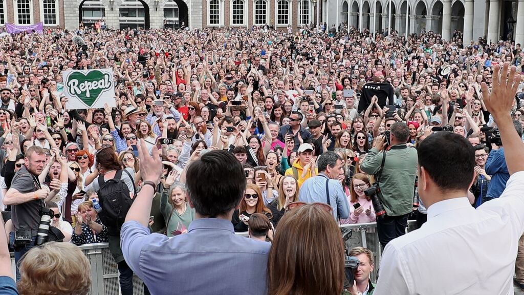 Minister for Health Simon Harris and Taoiseach Leo Varadkar wave at crowds in Dublin Castle. Photograph: Niall Carson/PA Wire