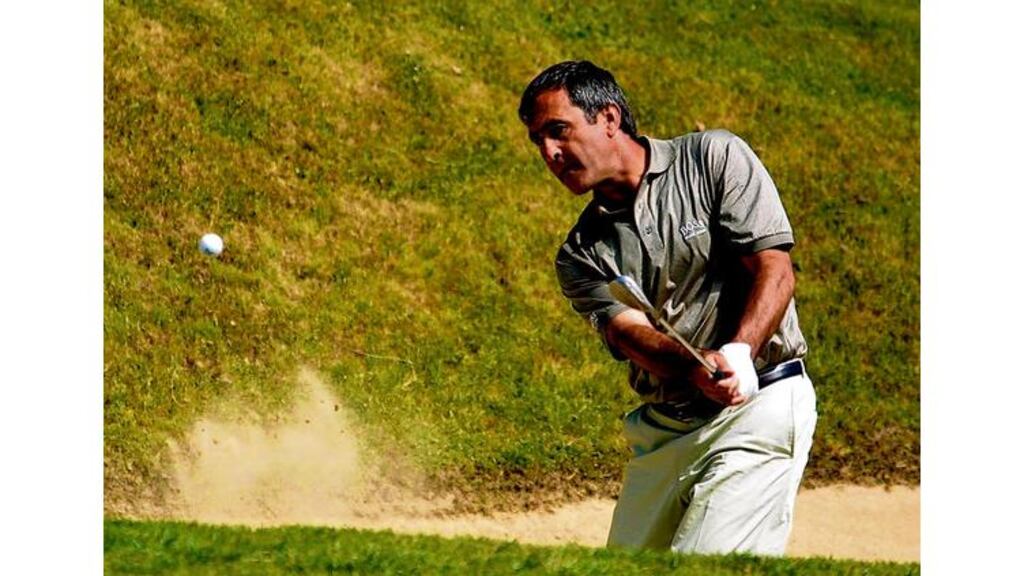 Spain's Seve Ballesteros: 'had his inimitable way of hunkering down low in the sand, digging in with his feet and pulling at the crease on the left leg of his trousers in order to get even lower and consolidate his set position.' - (Photograph: Getty Images).