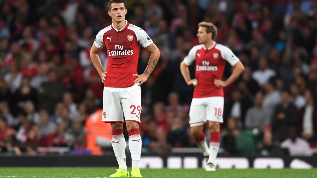 Granit Xhaka and Nacho Monreal of Arsenal look on after conceding a goal to Leicester at the Emirates Stadium. Photograph: Michael Regan/Getty Images