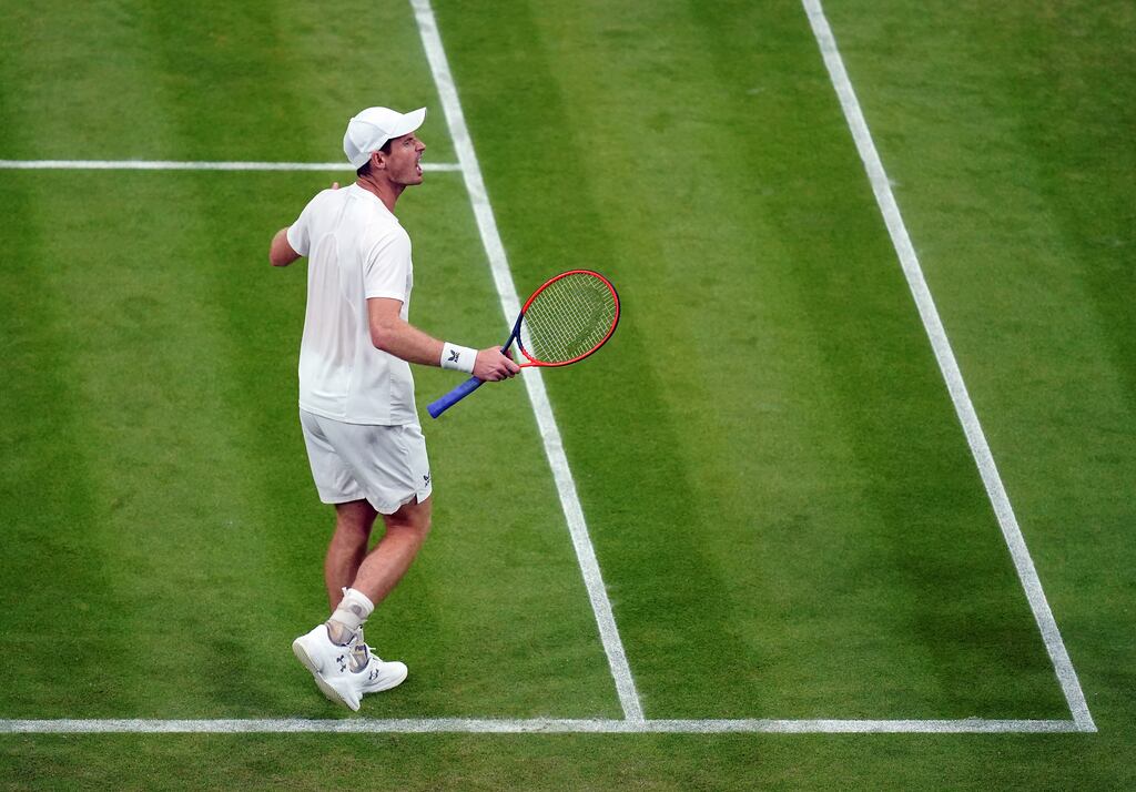 Andy Murray celebrates winning the third set during his match against Stefanos Tsitsipas. Photograph: John Walton/PA Wire