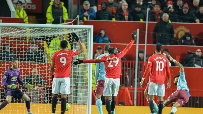 Tyrone Mings scores the equaliser. Photo: Peter Powell/EPA