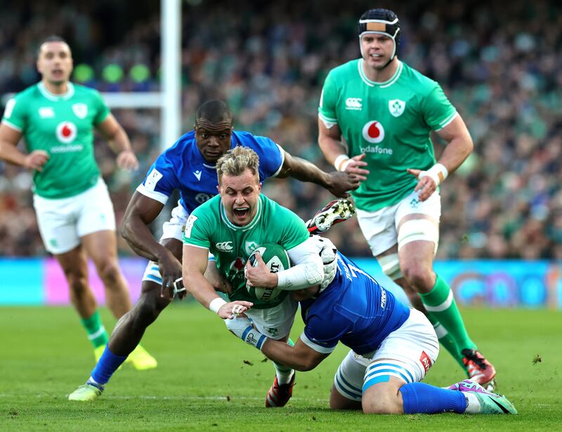 Ireland's Craig Casey is tackled by Manuel Zulani of Italy during the Six Nations match between Ireland and Italy at the Aviva stadium. Photograph: David Rogers/Getty Images